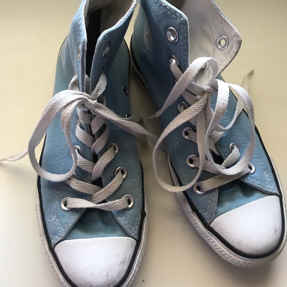 Light blue high top converse